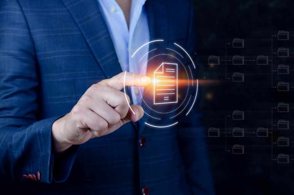 Businessman clicking on digital file icon